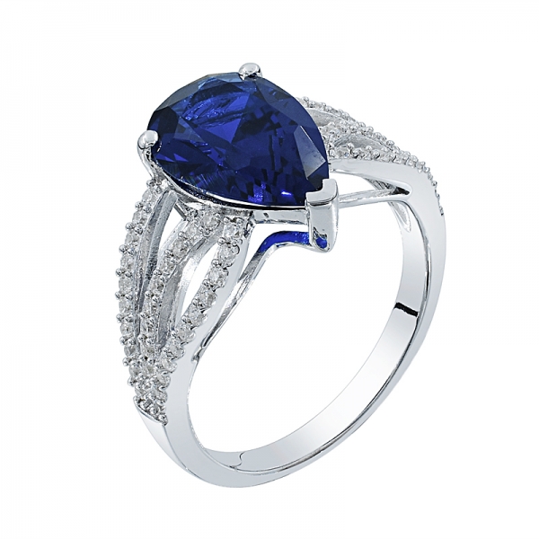 Classic Rhodium Plated Ladies Ring With Pear Shape Blue Nano 