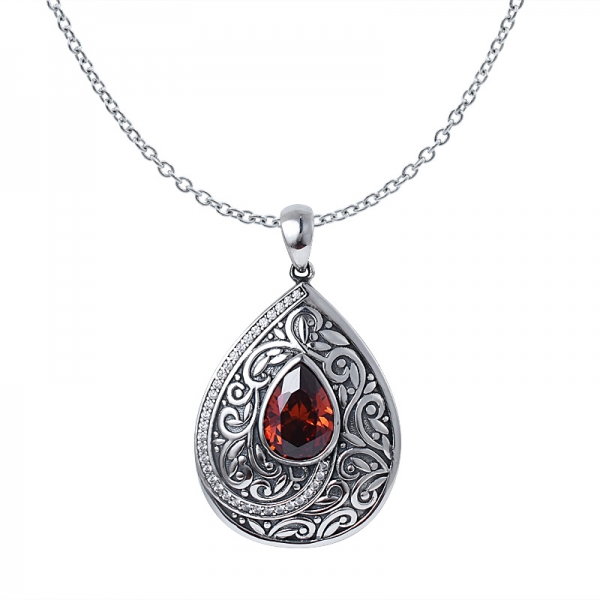 Created Garnet Cz Pear cut Black Artisan over sterling silver water shape pendant 