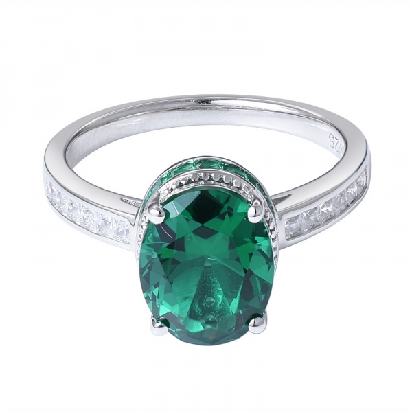 oval cutting created emerald rhodium over sterling silver ring 