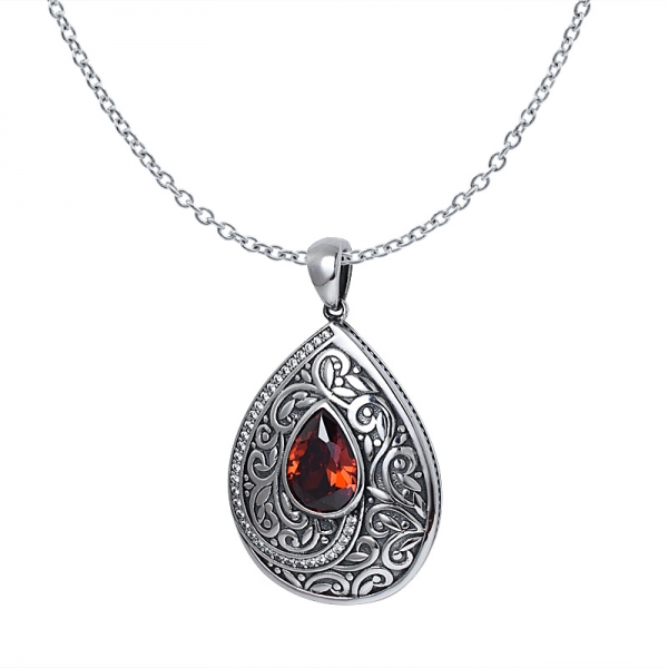 Created Garnet Cz Pear cut Black Artisan over sterling silver water shape pendant 