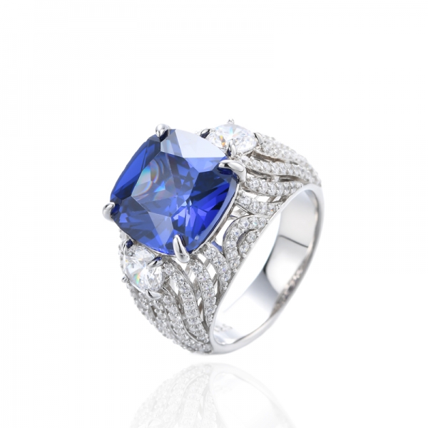 Cushion Tanzanite And Round White Cubic Zirconia Rhodium Silver Ring 