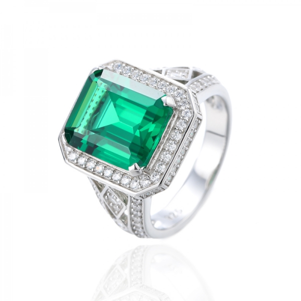 Emerald Cut Tanzanite And Round White Cubic Zirconia Rhodium Silver Ring 