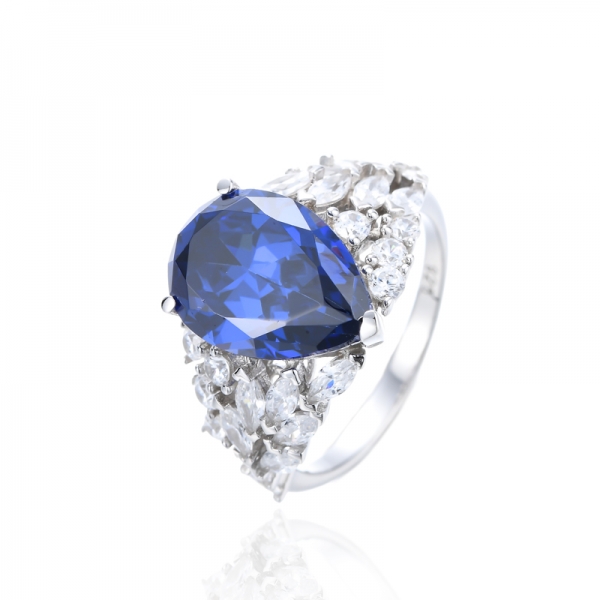 Pear Shape Tanzanite And White Cubic Zirconia Rhodium Silver Ring 