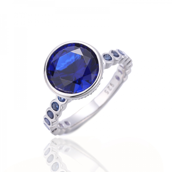 Round Tanzanite And White Cubic Zircon Rhodium Silver Ring 