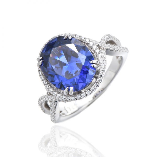 Oval Shape Tanzanite And Round White Cubic Zircon Rhodium Silver Ring 