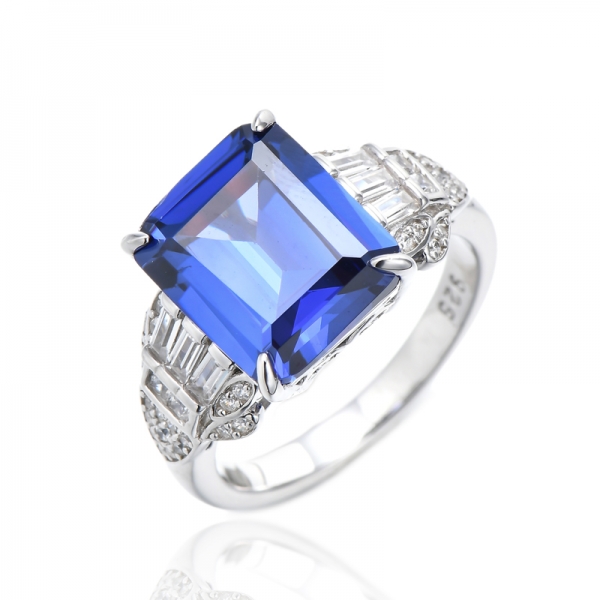925 Emerald Cut Tanzanite And White Cubic Zircon Rhodium Silver Ring 