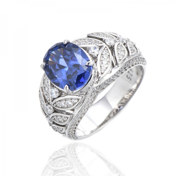 Oval Shape Tanzanite And Round White Cubic Zircon Rhodium Silver Ring 