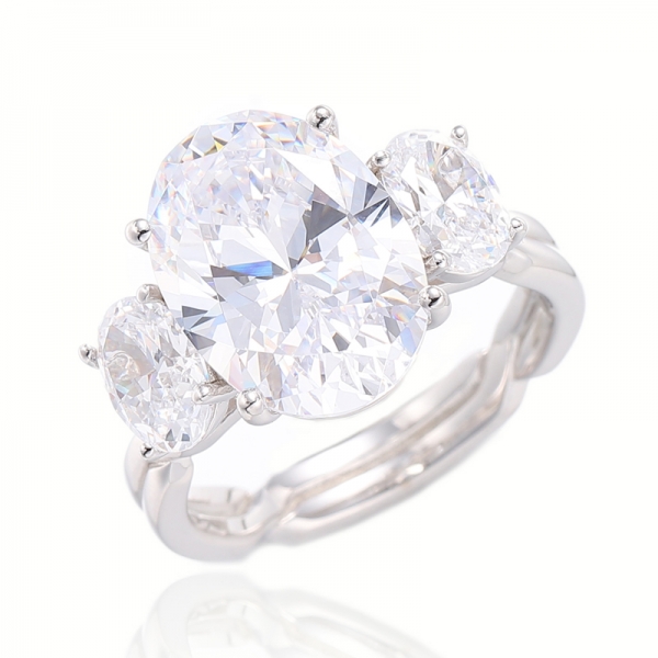 Oval Shape Tanzanite And White Cubic Zircon Rhodium Silver Ring 