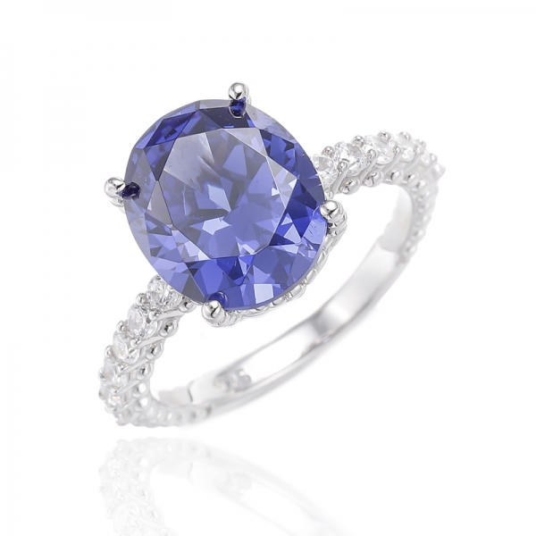 Oval Shape Tanzanite And Round White Cubic Zircon Rhodium Plating Silver Ring 