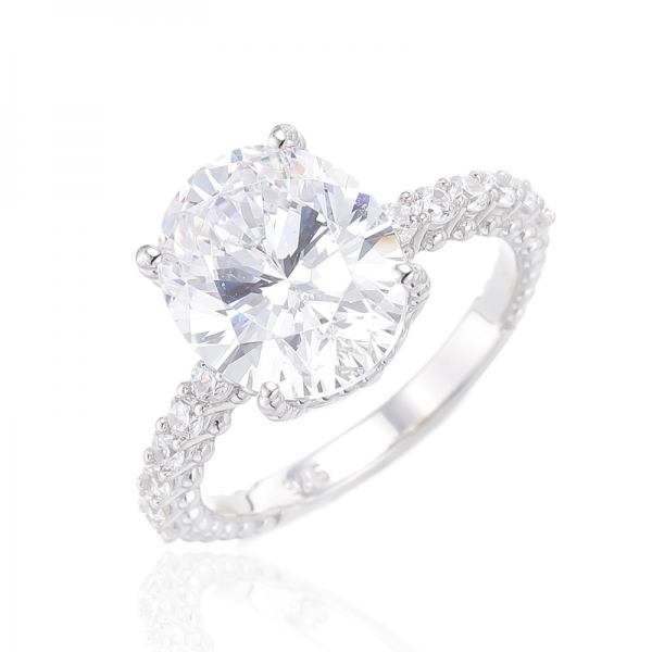 Oval Shape Tanzanite And Round White Cubic Zircon Rhodium Plating Silver Ring 